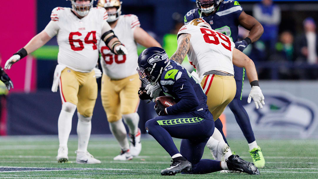 Seattle Seahawks linebacker Ernest Jones IV (13) intercepts the ball in the third quarter in an NFC Divisional Round game. Seattle Seahawks linebacker Ernest Jones IV (13) intercepts the ball in the third quarter in an NFC Divisional Round game.