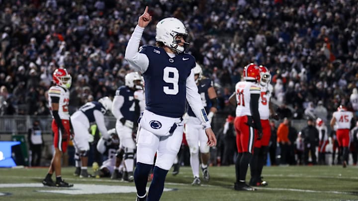 Nov 30, 2024; University Park, Pennsylvania, USA; Penn State Nittany Lions quarterback Beau Pribula (9) celebrates after scoring a touchdown against the Maryland Terrapins during the second quarter at Beaver Stadium. Nov 30, 2024; University Park, Pennsylvania, USA; Penn State Nittany Lions quarterback Beau Pribula (9) celebrates after scoring a touchdown against the Maryland Terrapins during the second quarter at Beaver Stadium.