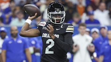 Dec 28, 2024; San Antonio, TX, USA; Colorado Buffaloes quarterback Shedeur Sanders (2) attempts a pass during the first quarter against the Brigham Young Cougars at Alamodome. Mandatory Credit: Troy Taormina-Imagn Images