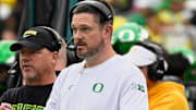 Oct 11, 2025; Eugene, Oregon, USA; Oregon Ducks head coach Dan Lanning instructs his team from the sideline against the Indiana Hoosiers during the third quarter at Autzen Stadium. Mandatory Credit: Troy Wayrynen-Imagn Images