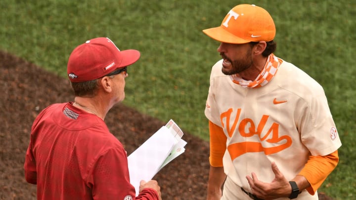 Tennessee coach Tony Vitello exchanges words with Arkansas coach Dave Van Horn after Arkansas' 3-2 win during their NCAA baseball game in Knoxville, Tenn. on Sunday, May 16, 2021.