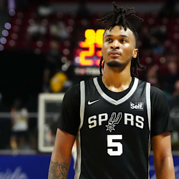 Jul 13, 2024; Las Vegas, NV, USA; San Antonio Spurs guard Stephon Castle (5) walks up court during the third quarter against the Portland Trail Blazers at Thomas & Mack Center. Mandatory Credit: Stephen R. Sylvanie-Imagn Images