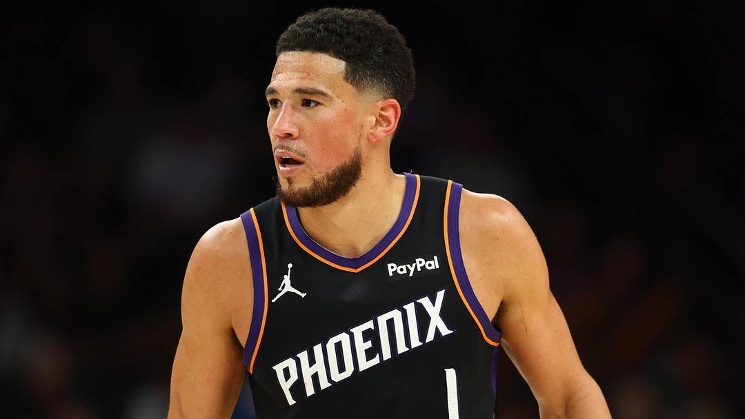 Apr 27, 2026; Phoenix, Arizona, USA; Phoenix Suns guard Devin Booker (1) against the Oklahoma City Thunder during game four of the first round of the 2026 NBA Playoffs at Mortgage Matchup Center. Mandatory Credit: Mark J. Rebilas-Imagn Images

