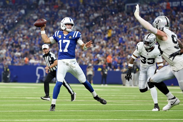 Indianapolis Colts quarterback Daniel Jones (17) throws a touchdown pass against the Las Vegas Raiders.