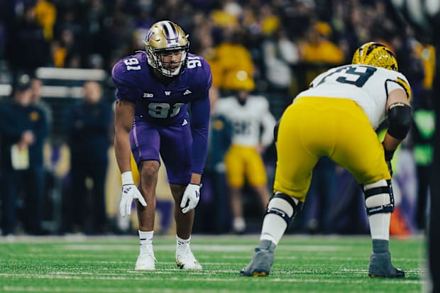 Isaiah Ward lines up on the edge against Michigan. 
