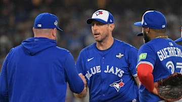 Oct 27, 2025; Los Angeles, California, USA; Toronto Blue Jays manager John Schneider (14) relieves pitcher Max Scherzer (31) in the fifth inning against the Los Angeles Dodgers during game three of the 2025 MLB World Series at Dodger Stadium. Mandatory Credit: Jayne Kamin-Oncea-Imagn Images