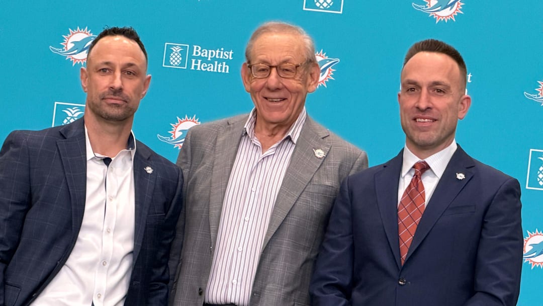 Miami Dolphins owner Stephen Ross (center) introduces new general manager Jon-Eric Sullivan (left) and coach Jeff Hafley on Jan. 22, 2026.