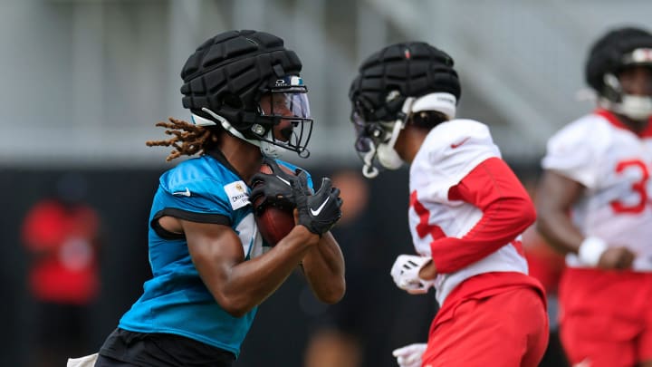 Jacksonville Jaguars wide receiver Joshua Cephus (19) runs the ball during a combined NFL football training camp session between the Tampa Bay Buccaneers and Jacksonville Jaguars Thursday, Aug. 15, 2024 at EverBank Stadium’s Miller Electric Center in Jacksonville, Fla. [Corey Perrine/Florida Times-Union]