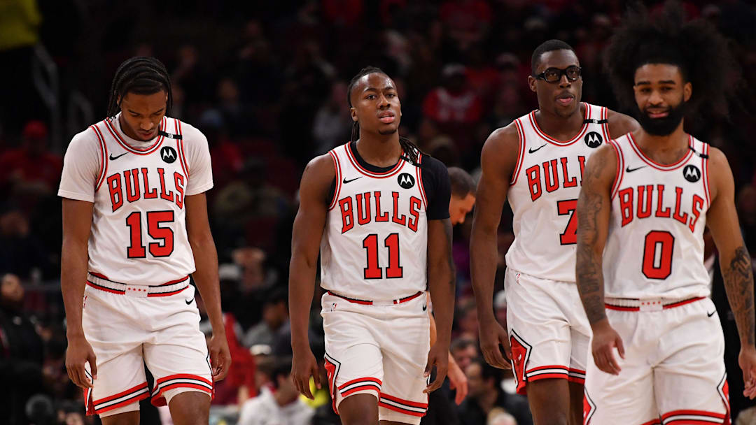 Feb 28, 2025; Chicago, Illinois, USA; (from left to right) Chicago Bulls forward Julian Phillips, guard Ayo Dosunmu, forward Jalen Smith, and guard Coby White are seen during a game against the Toronto Raptors at the United Center. Mandatory Credit: Patrick Gorski-Imagn Images