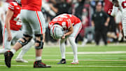 Ohio State Buckeyes kicker Jayden Fielding (38) reacts to missing a field goal during the Big Ten Conference championship game against the Indiana Hoosiers at Lucas Oil Stadium in Indianapolis on Dec. 6, 2025. Ohio State lost 13-10.