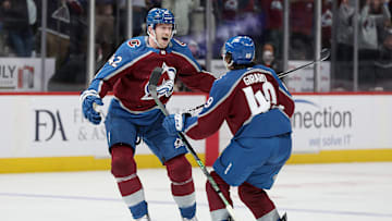Colorado Avalanche defensemen Josh Manson (42) and Samuel Girard (49)
