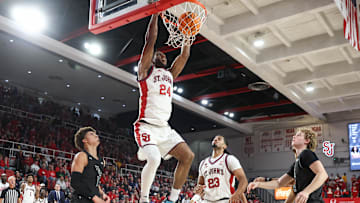 Nov 15, 2025; Queens, New York, USA;  St. John's basketball forward Zuby Ejiofor (24) dunks in the second half against the William & Mary Tribe at Carnesecca Arena.