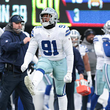 Dec 19, 2021; East Rutherford, New Jersey, USA; Dallas Cowboys defensive tackle Carlos Watkins (91) celebrates after a defensive play against the New York Giants during the second half at MetLife Stadium. Mandatory Credit: Vincent Carchietta-Imagn Images