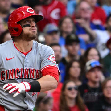 Jun 14, 2024; Milwaukee, Wisconsin, USA; Cincinnati Reds center fielder TJ Friedl (29) hits a solo home run in the third inning against the Milwaukee Brewers at American Family Field. Mandatory Credit: Benny Sieu-USA TODAY Sports