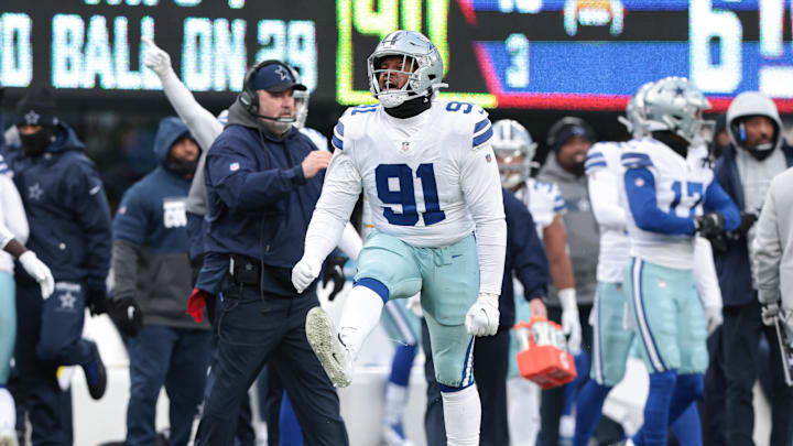 Dec 19, 2021; East Rutherford, New Jersey, USA; Dallas Cowboys defensive tackle Carlos Watkins (91) celebrates after a defensive play against the New York Giants during the second half at MetLife Stadium. Mandatory Credit: Vincent Carchietta-Imagn Images