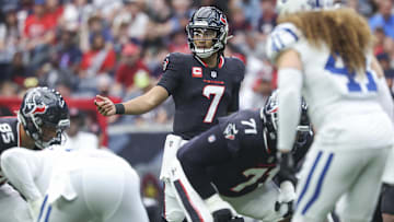 Oct 27, 2024; Houston, Texas, USA; Houston Texans quarterback C.J. Stroud (7) at the line of scrimmage during the game against the Indianapolis Colts at NRG Stadium. Mandatory Credit: Troy Taormina-Imagn Images