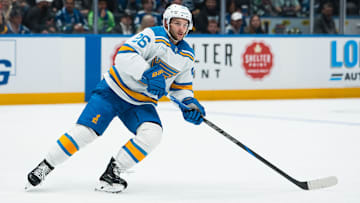 Oct 13, 2025; Vancouver, British Columbia, CAN; St. Louis Blues forward Nathan Walker (26) skates against the Vancouver Canucks in the third period at Rogers Arena. Mandatory Credit: Bob Frid-Imagn Images
