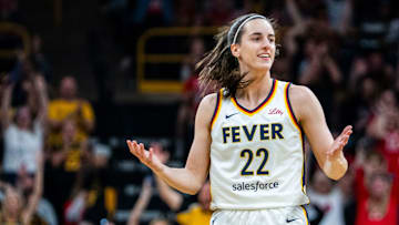 Indiana Fever guard Caitlin Clark (22) questions an official Sunday, May 4, 2025, during a preseason game between the Indiana Fever and the Brazil national team at Carver-Hawkeye Arena in Iowa City.