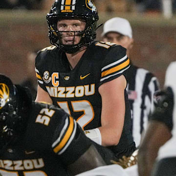 Aug 29, 2024; Columbia, Missouri, USA; Missouri Tigers quarterback Brady Cook (12) readies for the snap against the Murray State Racers during the first half at Faurot Field at Memorial Stadium. Mandatory Credit: Denny Medley-USA TODAY Sports