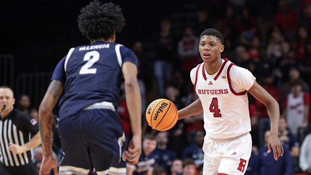 Rutgers Scarlet Knights guard Ace Bailey (4) dribbles up court during the second half against Monmouth Hawks forward Jaret Va