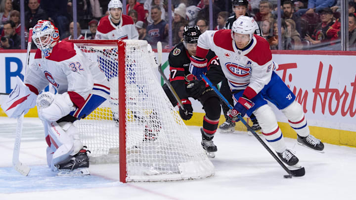 Mar 11, 2026; Ottawa, Ontario, CAN; Montreal Canadiens defenseman Mike Matheson (8) skates with the puck with Ottawa Senators left wing Warren Foegele (37) in pursuit during the first period at the Canadian Tire Centre. Mandatory Credit: Marc DesRosiers-IMAGN Images