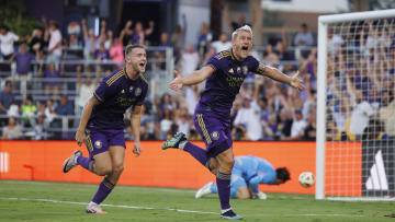 Jul 6, 2024; Orlando, Florida, USA; Orlando City defender Robin Jansson (6) and forward Duncan McGuire (13) celebrate a goal against D.C. United during the first half at Inter&Co Stadium. Mandatory Credit: Morgan Tencza-USA TODAY Sports