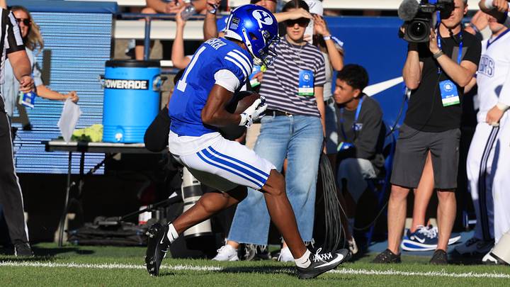 Sep 5, 2026; Provo, Utah, USA;  BYU Cougars wide receiver Legend Glasker (1) runs a catch in for a touchdown against the Utah Tech Trailblazers during the first quarter at LaVell Edwards Stadium.  Mandatory Credit: Rob Gray-Imagn Images
