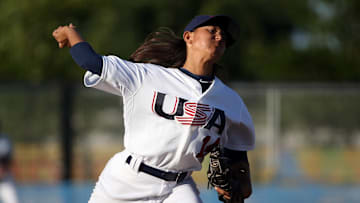 Jul 22, 2015; Toronto, Ontario, CAN; United States starting pitcher Kelsie Whitmore (14) delivers a pitch in the first inning against Cuba during the 2015 Pan Am Games at Ajax Pan Am Ballpark. USA beat Cuba 11-0. Mandatory Credit: Tom Szczerbowski-Imagn Images