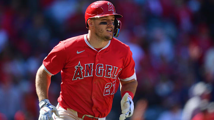 Apr 7, 2024; Anaheim, California, USA;  Los Angeles Angels center fielder Mike Trout (27) runs after hitting a solo home run against the Boston Red Sox during the eighth inning at Angel Stadium.