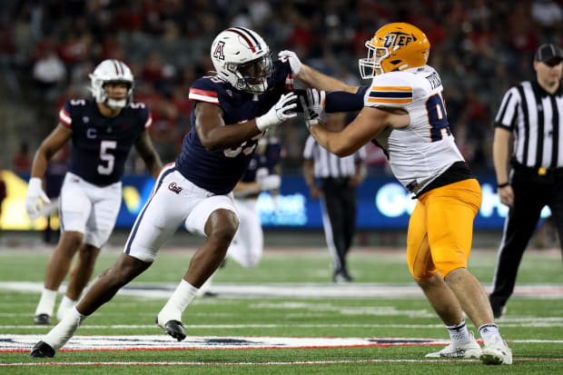 Russell Davis II (99) rushes against UTEP in Arizona's 2023 game in Tucson.