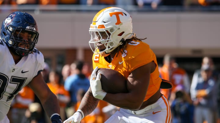 Nov 4, 2023; Knoxville, Tennessee, USA; Tennessee Volunteers running back Jaylen Wright (0) runs the ball against the Connecticut Huskies during the first half at Neyland Stadium. Mandatory Credit: Randy Sartin-USA TODAY Sports