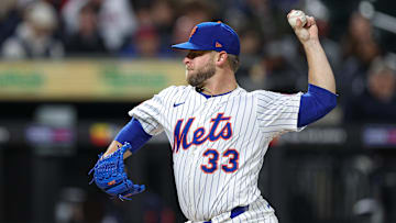 Apr 17, 2025; New York City, New York, USA; New York Mets relief pitcher A.J. Minter (33) delivers a pitch during the eighth inning against the St. Louis Cardinals at Citi Field. Mandatory Credit: Vincent Carchietta-Imagn Images