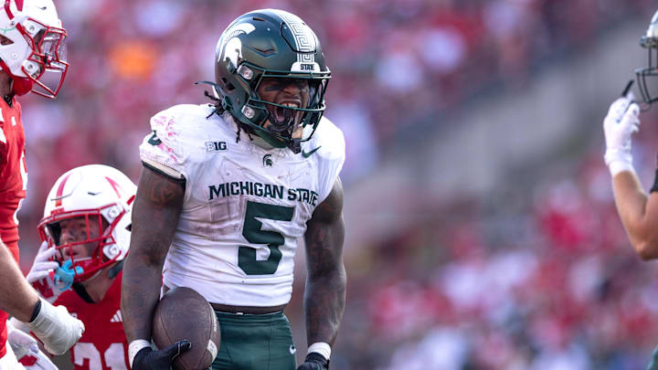 Oct 4, 2025; Lincoln, Nebraska, USA;  Michigan State Spartans running back Makhi Frazier (5) celebrates during the game against Nebraska at Memorial Stadium. Mandatory Credit: Kylie Graham-Imagn Images