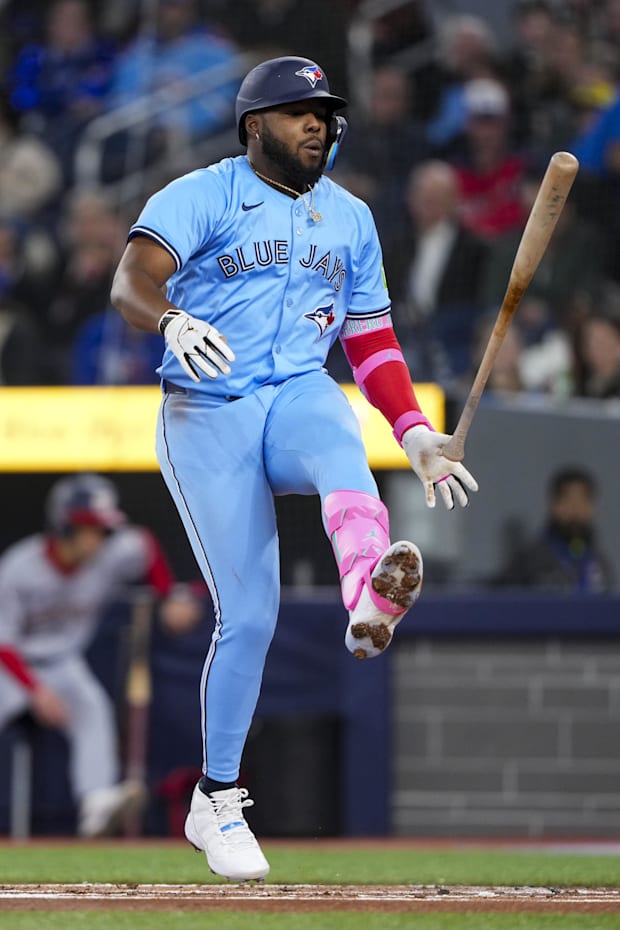 Blue Jays first baseman Vladimir Guerrero Jr. attempts to kick his bat