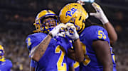 Nov 22, 2025; Atlanta, Georgia, USA; Pittsburgh Panthers wide receiver Kenny Johnson (2) celebrates after a touchdown against the Georgia Tech Yellow Jackets in the first quarter at Bobby Dodd Stadium at Hyundai Field. Mandatory Credit: Brett Davis-Imagn Images