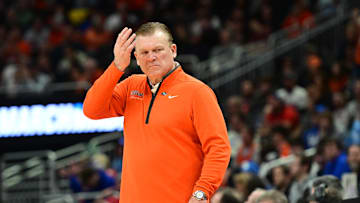 Mar 21, 2025; Milwaukee, WI, USA: Illinois Fighting Illini head coach Brad Underwood watches play down court during the first half against the Xavier Musketeers at Fiserv Forum. Mandatory Credit: Benny Sieu-Imagn Images