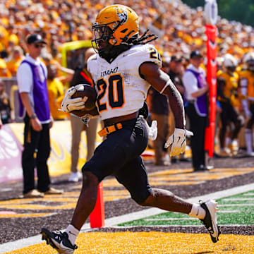 Idaho Vandals running back Elisha Cummings (20)
