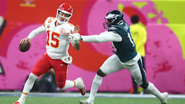 Kansas City Chiefs quarterback Patrick Mahomes (15) is tackled by Philadelphia Eagles linebacker Josh Sweat (19)