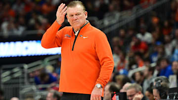 Mar 21, 2025; Milwaukee, WI, USA: Illinois Fighting Illini head coach Brad Underwood watches play down court during the first half against the Xavier Musketeers at Fiserv Forum. Mandatory Credit: Benny Sieu-Imagn Images