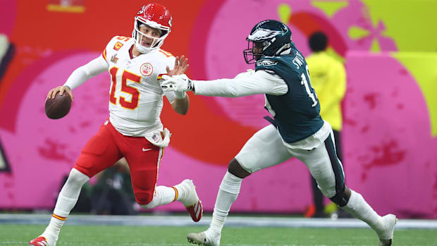 Kansas City Chiefs quarterback Patrick Mahomes (15) is tackled by Philadelphia Eagles linebacker Josh Sweat (19)