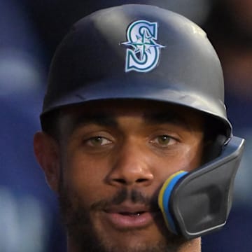 Seattle Mariners center fielder Julio Rodriguez (44) celebrates in the dugout after hitting a solo home run in the fifth inning against the Los Angeles Angels at Angel Stadium on July 24. 