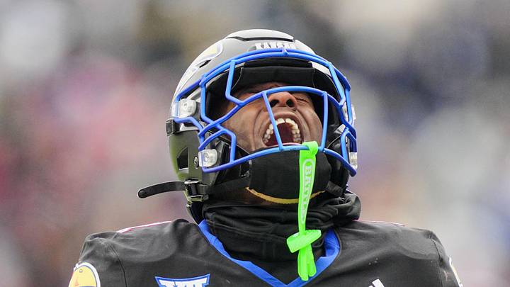 Kansas Jayhawks wide receiver Emmanuel Henderson Jr. celebrates