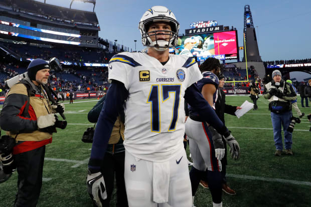 Jan 13, 2019; Foxborough, MA, USA; Los Angeles Chargers quarterback Philip Rivers (17) walks off of the field after the Chargers loss to the New England Patriots in an AFC Divisional playoff football game at Gillette Stadium. Mandatory Credit: David Butler II-USA TODAY Sports