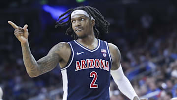Mar 7, 2024; Los Angeles, California, USA; Arizona Wildcats guard Caleb Love (2) signals during the