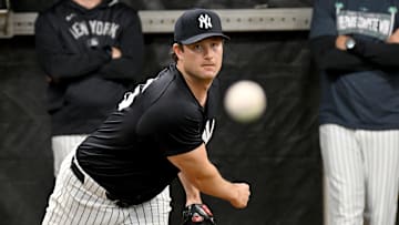 Feb 16, 2025; Tampa, FL, USA; New York Yankees pitcher Gerrit Cole (45)  throws a pitch during spring training at George M. Steinbrenner Field. Mandatory Credit: Jonathan Dyer-Imagn Images