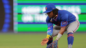 Apr 1, 2025; Miami, Florida, USA; New York Mets shortstop Luisangel Acuna (2) catches a ground ball to retire Miami Marlins shortstop Xavier Edwards (not pictured) during the fifth inning at loanDepot Park. Mandatory Credit: Sam Navarro-Imagn Images
