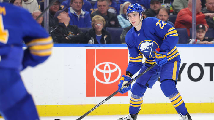 Mar 27, 2025; Buffalo, New York, USA;  Buffalo Sabres right wing Jack Quinn (22) looks to make a pass during the second period against the Pittsburgh Penguins at KeyBank Center. Mandatory Credit: Timothy T. Ludwig-Imagn Images