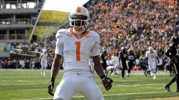 Nov 30, 2024; Nashville, Tennessee, USA;  Tennessee Volunteers wide receiver Dont'e Thornton Jr. (1) celebrates his touchdown with his teammates against the Vanderbilt Commodores during the first half at FirstBank Stadium. Mandatory Credit: Steve Roberts-Imagn Images