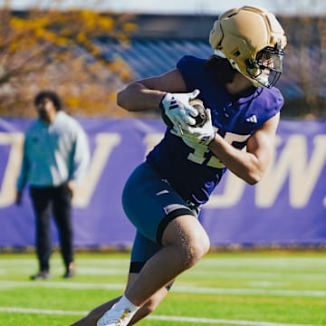 Austin Simmons heads upfield in ball on the East field. 