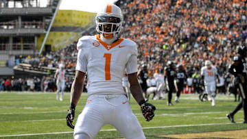 Nov 30, 2024; Nashville, Tennessee, USA;  Tennessee Volunteers wide receiver Dont'e Thornton Jr. (1) celebrates his touchdown with his teammates against the Vanderbilt Commodores during the first half at FirstBank Stadium. Mandatory Credit: Steve Roberts-Imagn Images